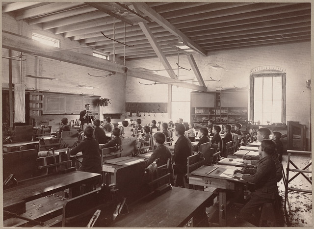 Wood-working room, North Bennet Street. Mr. Eddy giving instruction to the class.