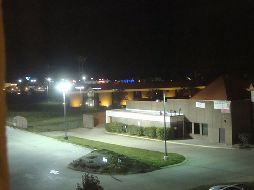 Nighttime view from my hotel room by C-Bunny, On the other side of the Holiday Inn Express, there was a Super 8 Motel and a residential neighborho