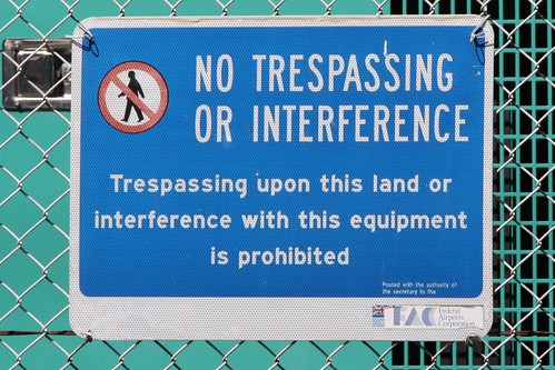 "No Trespassing or Interference" sign at Melbourne Airport