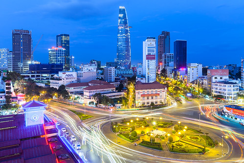 Ho Chi Minh City by Elena Ermakova, View of the city after sunset with Bitexco Financial Tower on the background, District 1, Ho Chi Min