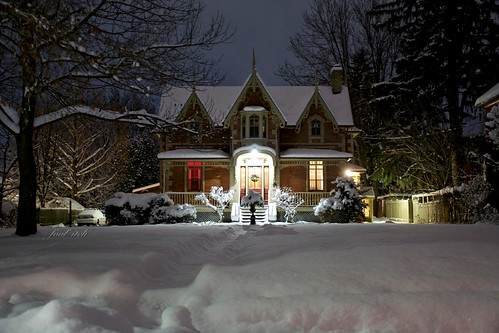 gothicrevival architecture snow trees winter house building night lights white peaceful outdoor stratfordon canada