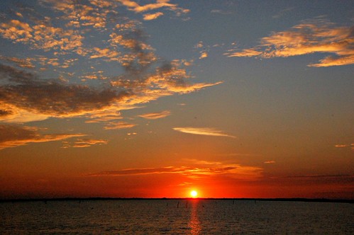 Sunset by The Old Texan, A beautiful sunset at Navarro Mills Lake.
The sky even became redder after this shot. But my battery