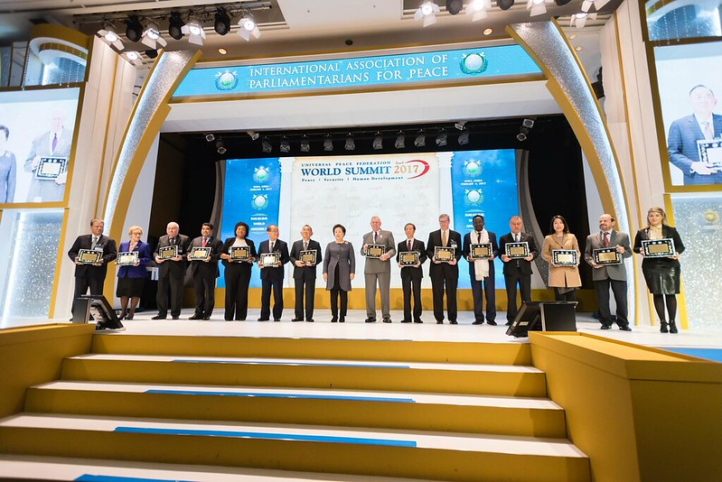 Dr. Hak Ja Han Moon (center) with the 13 newly announced regional co-chairs of IAPP