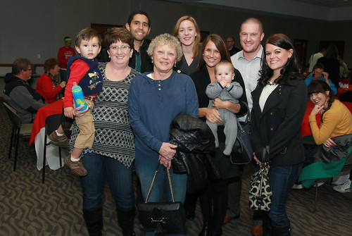 Deb Ayres, Vice President for Human Resources, surrounded by Lindenwood staff members and family