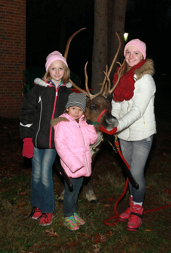 Emma, Megan and Zoie Russell (grandchildren of Lindewnood employees Terry Russell and Lynn Russell) with Jingles the Reindeer