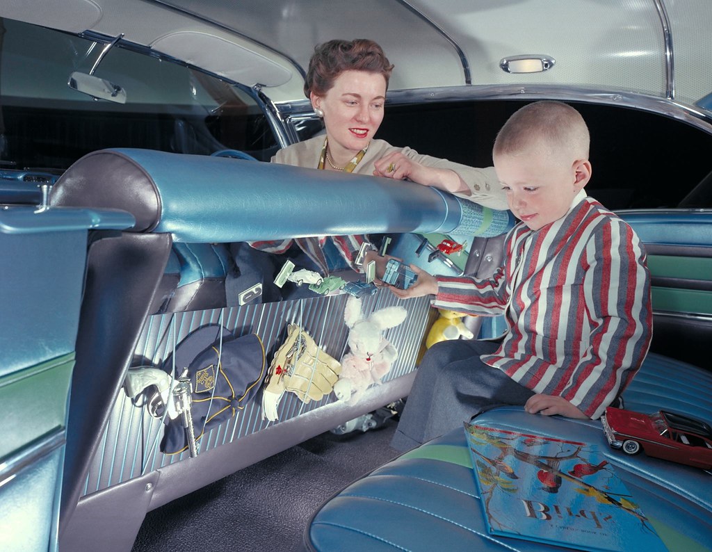 1958 Oldsmobile Carousel Damsel of Design Peggy Sauer and nephew with her 1958 Oldsmobile Carousel which was designed with children in mind