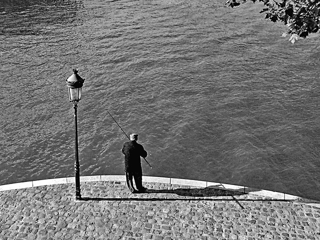 Paris forever in B&W. The Fisherman under Lamppost.