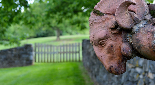 museumoftheshenandoahvalley 901amherststreet winchester virginia va museum art history statue sculpture architecture building finearts decorativearts garden park statuegarden space trees plants wall gate structure design folly landscape scenic outdoors nature light fence animal head goat ram perspective depth field color brown red green