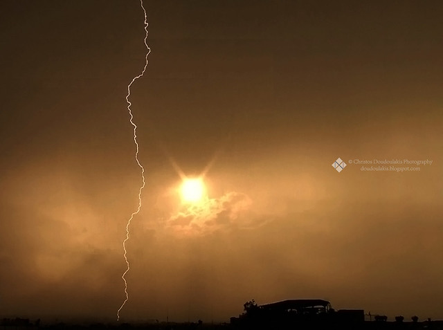 Lightning in front of the sunset