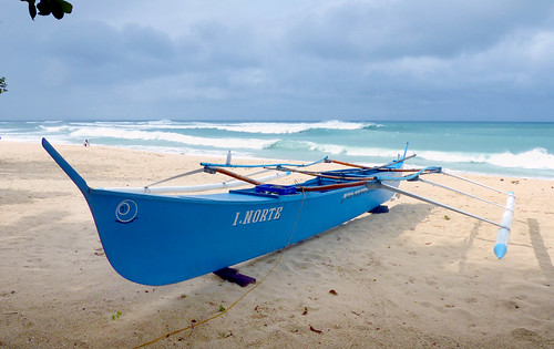 blue fishing boat philippines ilocosnorte outrigger watercraft beach sand fz200 bridgecamera publicdomaindedicationcc0 geotagged freephotos panasonic cco