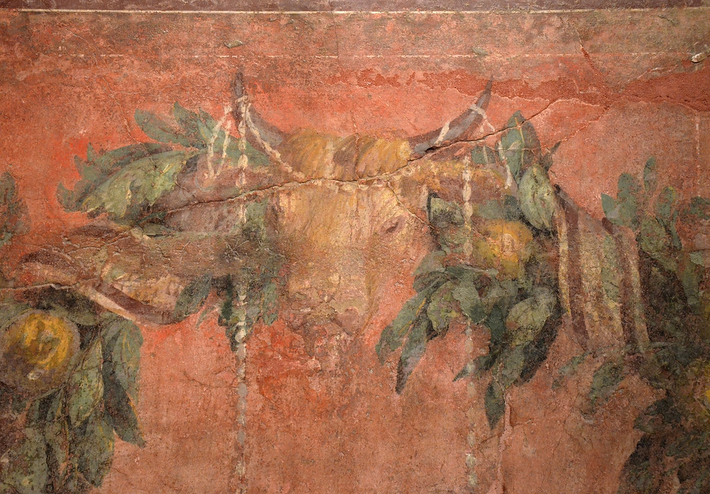 Fresco wall painting with garland of fruits, leaves and sacrificial bull's head (bucranium), from the exedra of the Villa of Publius Fannius Synistor at Boscoreale, 40–30 BC, Empire of colour. From Pompeii to Southern Gaul, Musée Saint-Raymond Toulouse