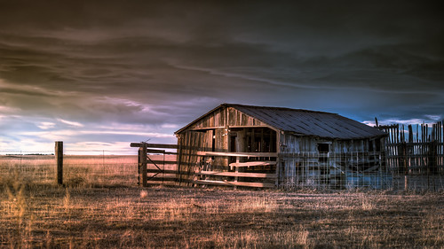colorado farmhouse barn old rustic rush yoder rural farm land acreage alone desolate sky menacing