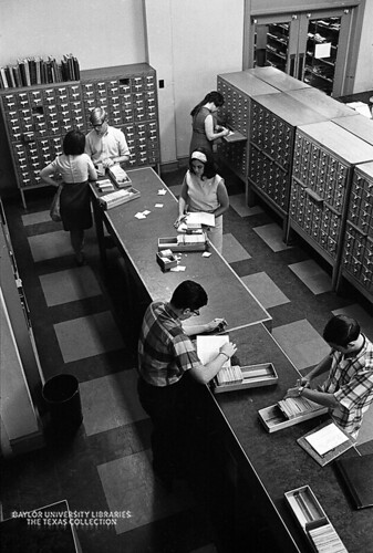 Studying candids in the Carroll Library, Baylor University, 1968 (7)