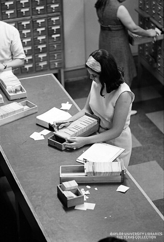 Studying candids in the Carroll Library, Baylor University, 1968 (13)