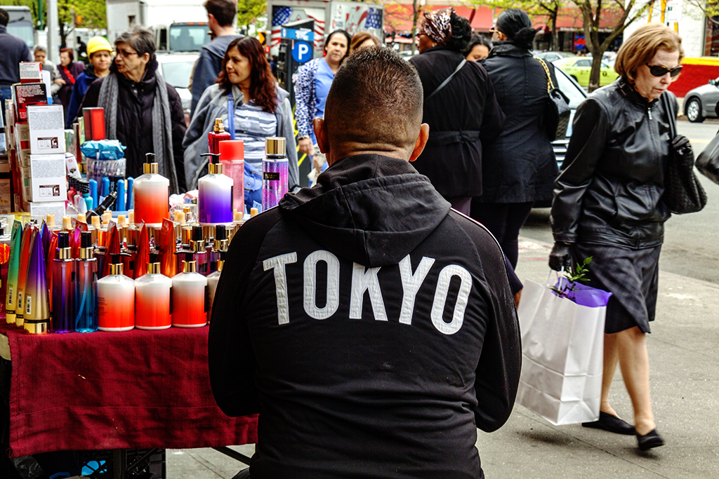 Man with TOKYO on hoodie--Washington Heights