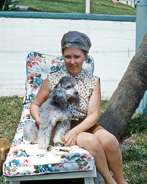 Florida 1961, mature woman with poodle, location believed to be the Biltmore Hotel in Ormond Beach