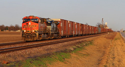 NS #145 west of Dawson by HighHor$epower, #145 speeds across the prairie on the long tangent west of Dawson with a fine looking BNSF ES44DC on