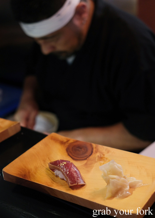 Chef Kazu Nakatani and his marinated tuna with gold leaf during his omakase sushi at Osaka Bar in Darlinghurst Sydney