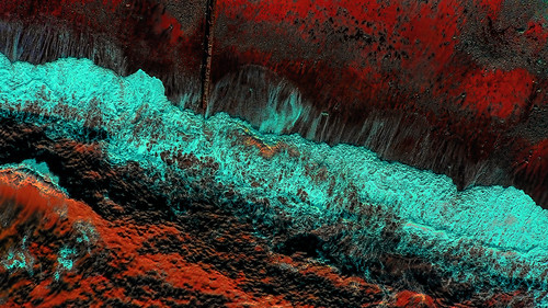 abstract aerial view ocean beach crimson scarlet dramatic trurquoise crashingwaves waves crest sea seascape surf surftrailing coast color drama ruby garnet burntorange brown seashore red curves abstractlandscape stormy beachlandscape redabstract rustyred earthy earth modern contemporary drone above perspective abstractaerialview catchavista catchavistaaerial