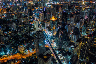 Asoke district center business of heart capital city on Sukhumvit road in Bangkok city light up at night