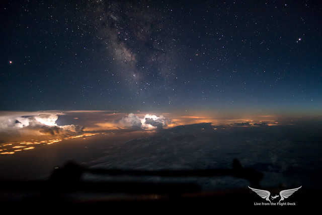 Bright Milky Way against a stormy coast line. Flight London - Madrid, routing abeam Biarritz.