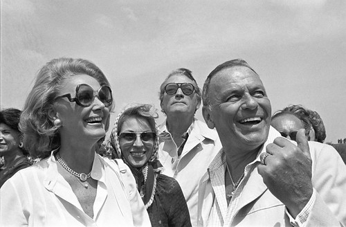 Frank and Barbara Sinatra wearing her Bulgari necklace with 1857 $1 gold coin