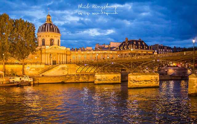 The Pont des Artes and the Institut de France from the Seine, Paris France