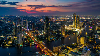 Panorama of Sathorn and Silom business district Bangkok Thailand at sunset.