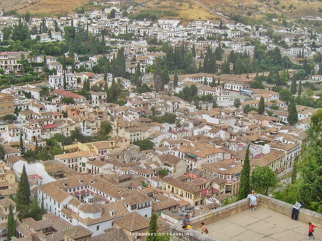 Looking down from the walls of the Alhambra to Granada's former Arabic barrio, the beautiful Albaicín! This is Granada's bohemian and artistic centre filled with live music. The network of winding cobbled streets and whitewashed houses perched on the hill