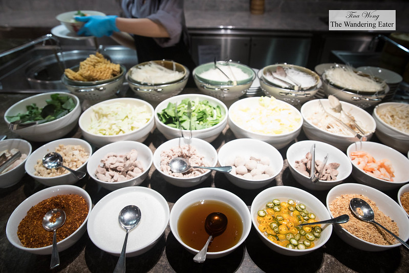The various chioces for noodles, vegetables, proteins and toppings for your own noodle bowl at the JW Cafe during breakfast