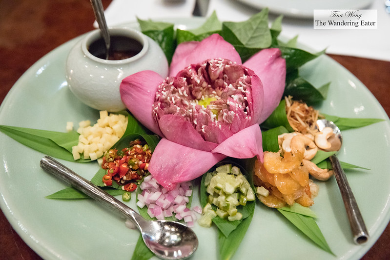 Miam Kam เมี่ยงคำTraditional Thai snack arranged with the combination of ingredientstoasted dried shrimps, toasted coconut, peanut, lime, ginger wrapped in betel leaves, palm sugar and shrimp paste dipping sauce
