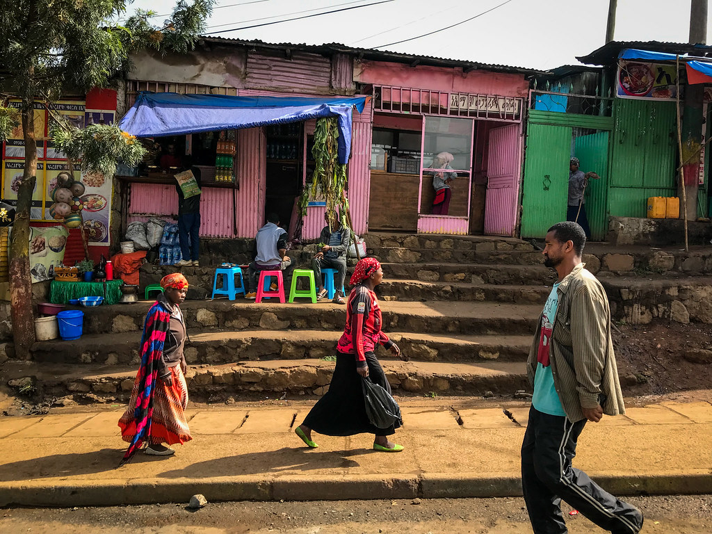 Pedestrians walking in Addis Ababa, Ethiopia.