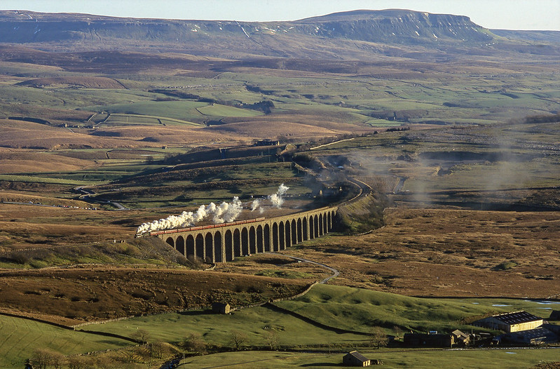 In pre  Harry Potter days GWR 5972 'Olton Hall' hauls an S&C 'Christmas Special' over Ribblehead Viaduct on a beautifully clear and sunny December 19th 1999.
 Note. No drones were used during the making of this image :-)