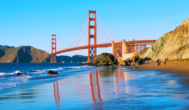 The Golden Gate Bridge. Reflections on beach