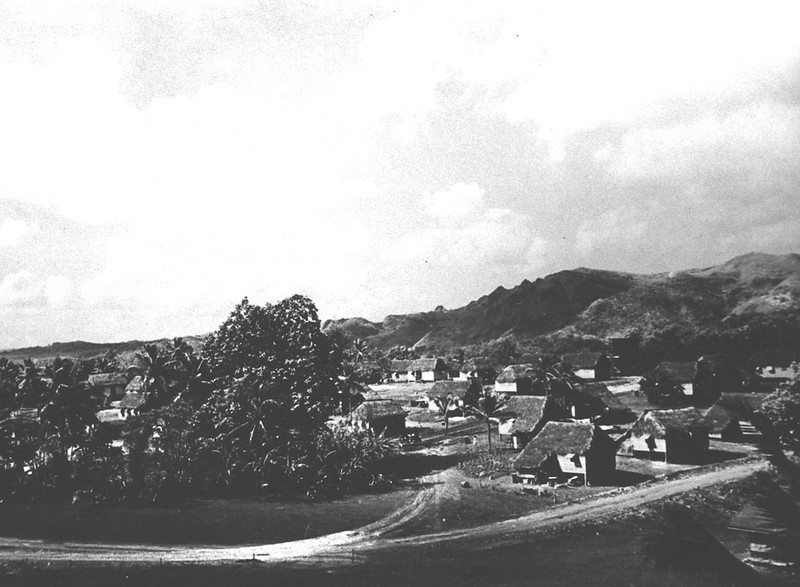 Homes of Sinajana village are protected by rolling hills of interior Guam, in the background, in this historic photo.

Micronesian Area Research Center (MARC)