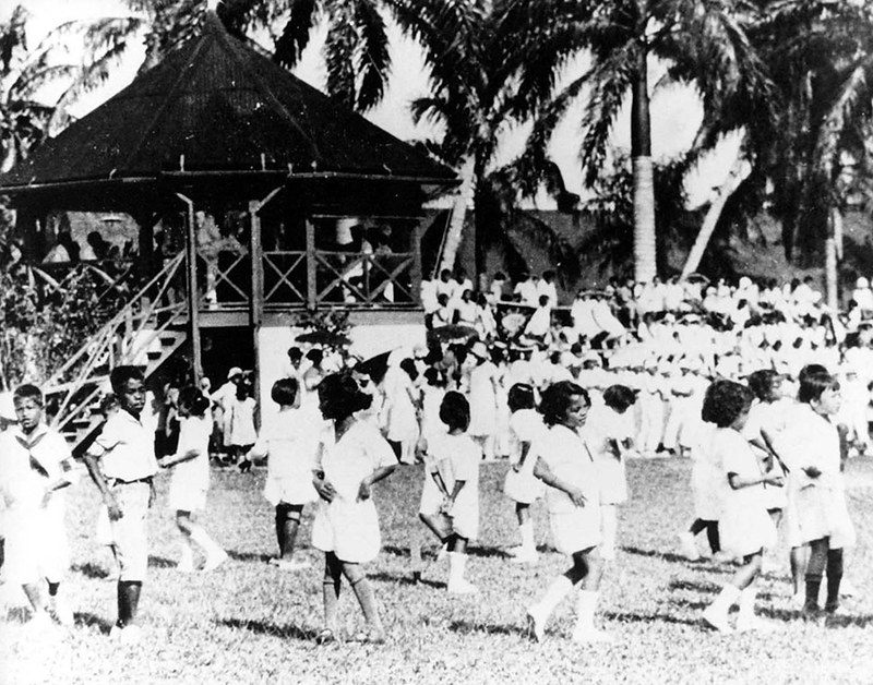Schoolchildren playing at Plaza de España. Though the naval administration's educational system was established since 1904 Chamorro remained the predominant language of Guam until the 1960s.

Micronesian Area Research Center (MARC)