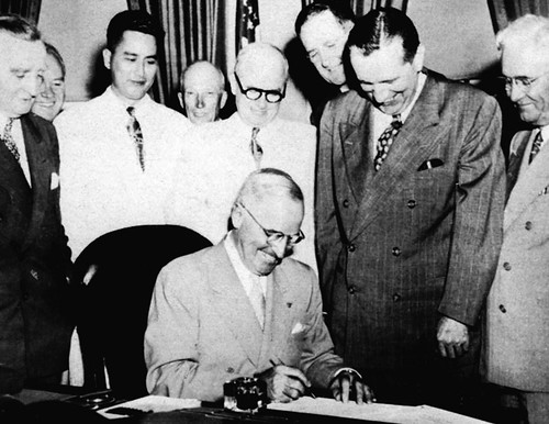 President Harry S. Truman signs the Guam Organic Act, 1950.

Micronesian Area Research Center (MARC)
