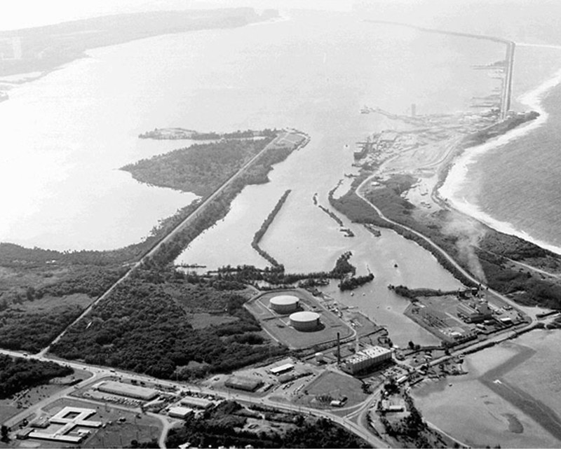 With the recapture of Guam during World War II all of the land abutting Apra Harbor was acquired by the U.S. Navy as the island was transformed into a military fortress.

Andersen Air Force Base