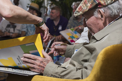 George Wein signs the Folkways box set at Jazz Fest day 3 on April 27, 2019. Photo by Ryan Hodgson-Rigsbee RHRphoto.com