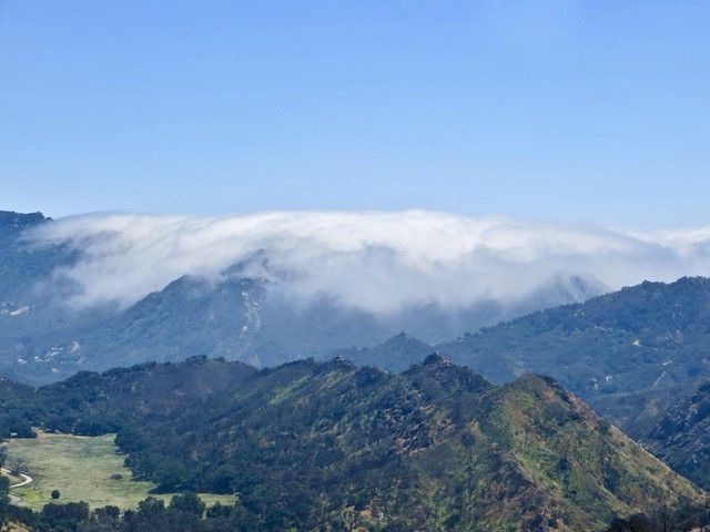 marine layer crowds the mountains