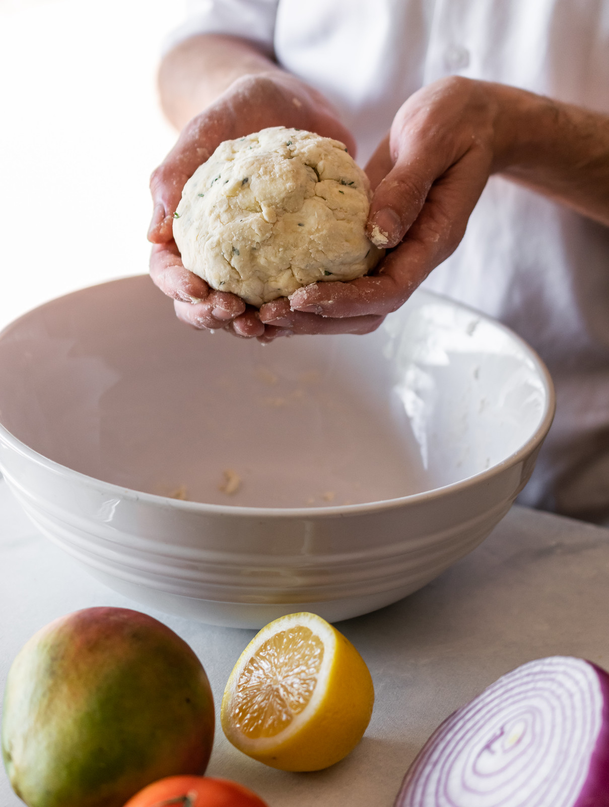 gather the dough into a ball, then wrap it in plastic