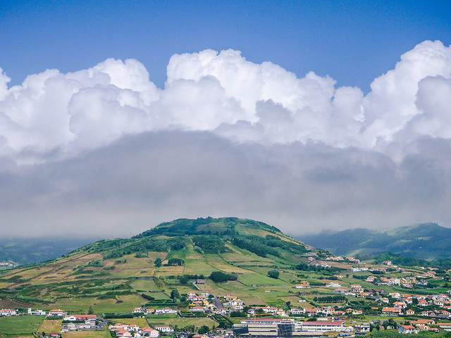 Cumulus clouds over the volcano
