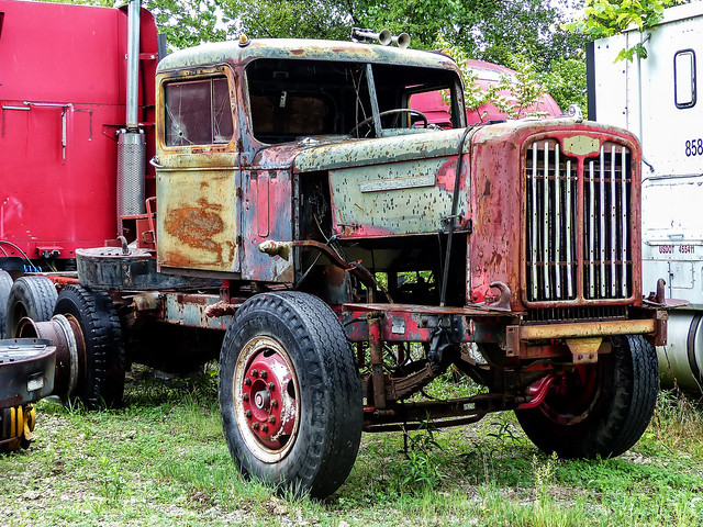 Rusty Old Shell Of An Autocar Semi Tractor