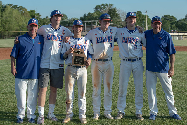 Coach Fleer, Ast Coach Menley and the 2019 Seniors Celebrate the District Championship