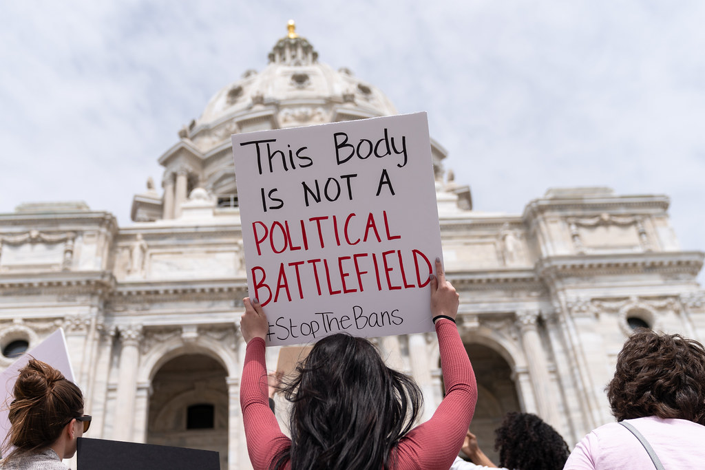 This body in not a political battlefield sign at a Stop Abortion Bans Rally in St Paul, Minnesota