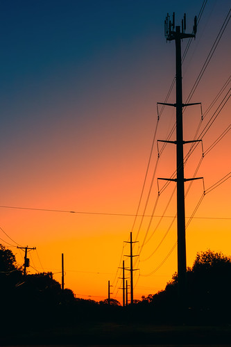 Early Morning Wires by 75CentralPhotography, The sun rises behind electric transmission towers and lines in North Dallas.400d apsc canon canonef2