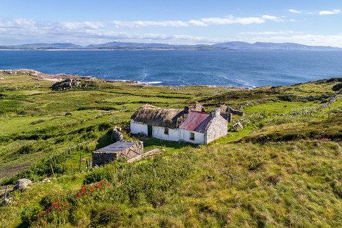 ancient stone county donegal ireland landscape tourist tourism site visit scenic landmark dji drone quadcopter uav aerial phantom four 4 djiglobal pro p4p thatched famine thatch roof dry sun blue sky summer country side countryside gareth wray photography irish eire field colourful clear day horizon coast vacation farm grassland maghery crohy head sea arch stack dungloe dunglow hill old abandoned house cottage homestead home ruin grass