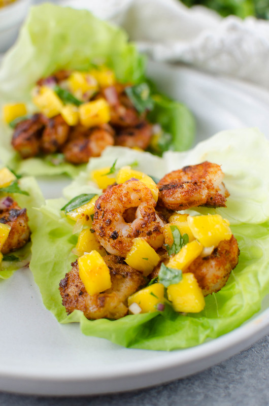 Blackened Shrimp Lettuce Wraps with Mango Salsa - delicious, healthy 15 minute dinner! Spicy shrimp in crisp lettuce wraps with mango salsa on top! #paleo #lowcarb