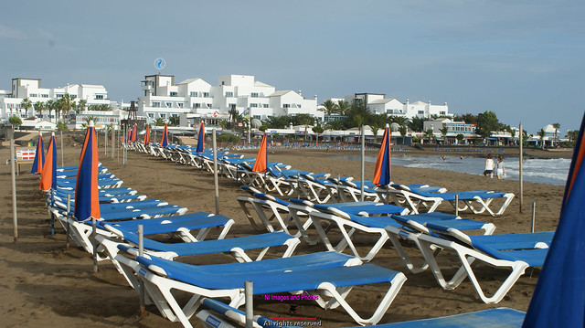 Sun beds on the beach waiting for the tourists and sun worshippers