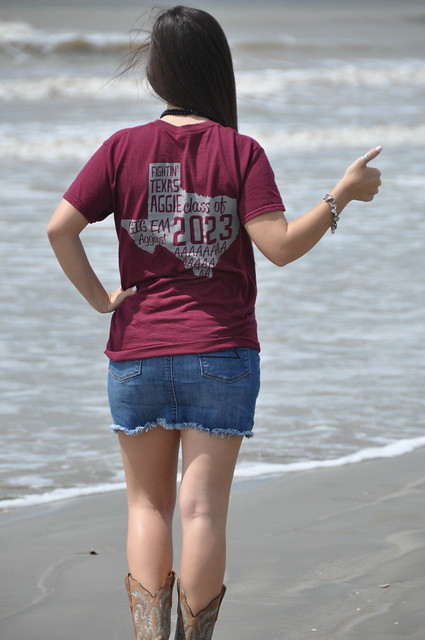 Aggie Girl Thumbs Up on Galveston Beach, Texas